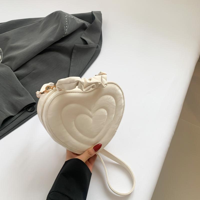

Casual portable love bag, foreign style design bag for women 2024 summer new trend fashion simple messenger bag for women білий
