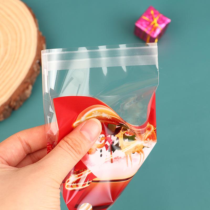 100Pcs Saco de presente de Natal autoadesivo biscoitos doces saco de embrulho festa de ano presente lanche cozimento saco plástico