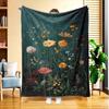 Eine Plüschdecke mit einem lebendigen Blumendesign auf grünem Hintergrund, hochauflösender Digitaldruck, für alle Jahreszeiten geeignet, perfekt für die Verwendung o