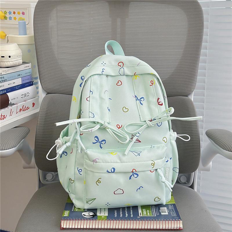 Cute Bow Tie Print School Backpack Lightweight Nylon Zipper Daypack with Front Pocket for Teen Girls Daily Travel