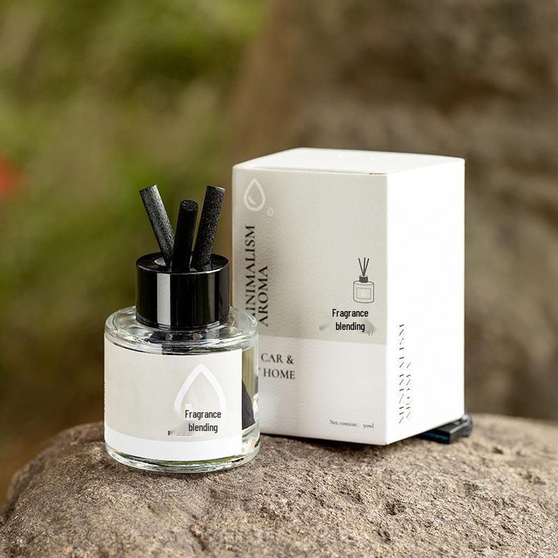Niche Aromatherapy Car Freshener: High-End Interior Ornament with Long-Lasting Light Fragrance and Odor Removal.