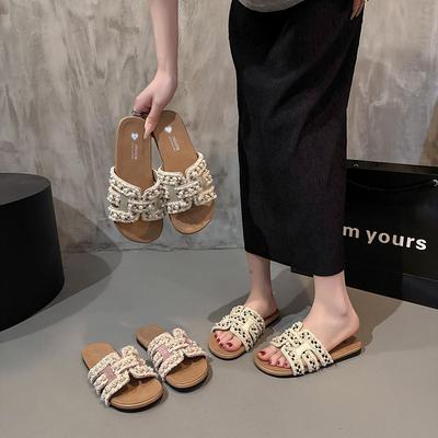 Été nouveau Xiaoxiangfeng pantoufles plates pour femmes printemps semelle souple fée polyvalentes perle sandales de plage