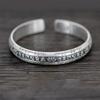 Engraved Open Cuff Bracelet with Vintage Script Detail and Floral Accent, Silver Tone Bangle for Festive Styling and Everyday Wear Use