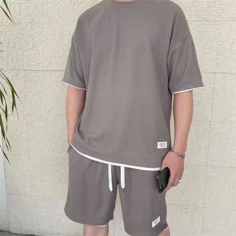 New Waffle Suit Men's Summer Explosion Short-sleeved T-shirt Men's Fake Two-piece Five-point Pants Suit Spot Batch Ropa