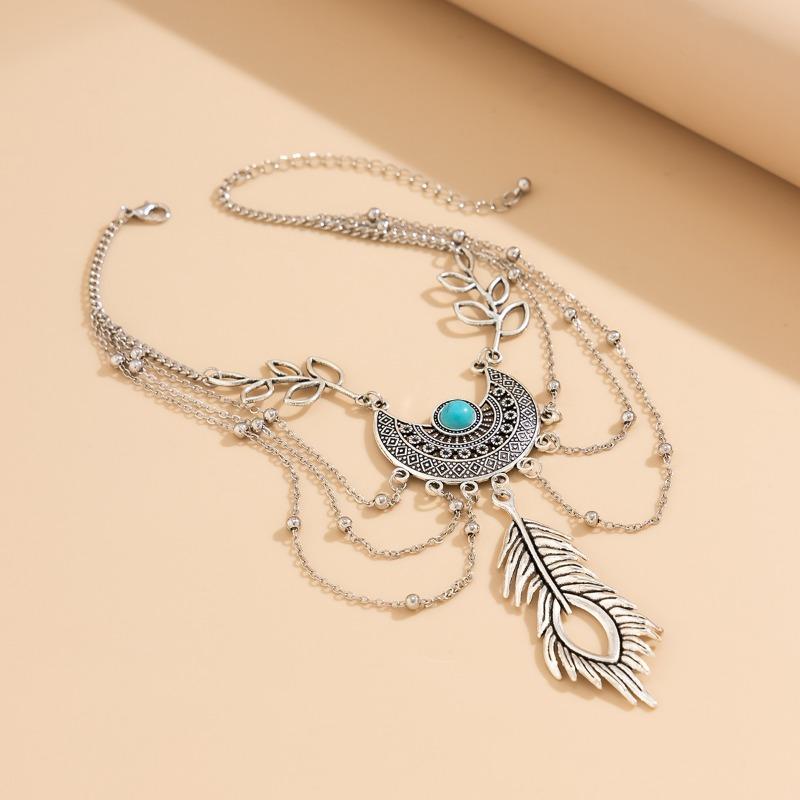 Braccialetto con catena in metallo con nappa a foglia di piuma vintage per donne e ragazze, bracciale punk bohemien