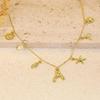 Ocean Theme Gold Charm Necklace with Initial Shells Letter Pendant Suitable for Surfer Girls and Beach Enthusiasts