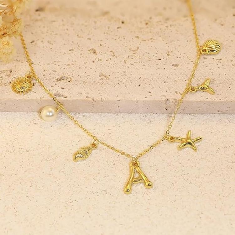 Ocean Theme Gold Charm Necklace with Initial Shells Letter Pendant Suitable for Surfer Girls and Beach Enthusiasts
