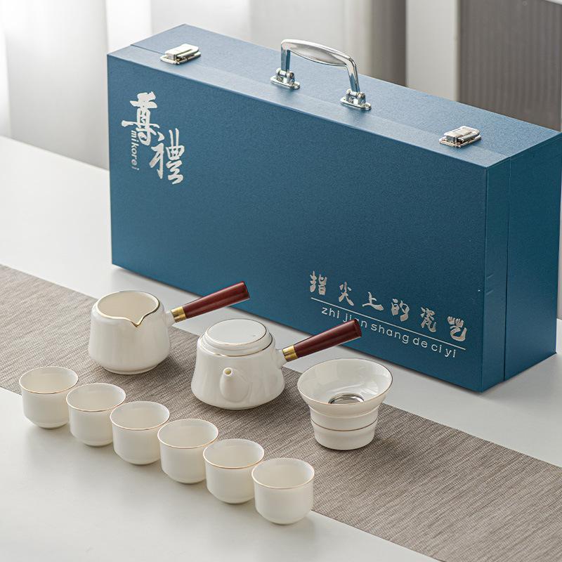 Light luxury suet jade white porcelain kung fu tea set, household gold-painted high-end < unk > pot tea cup gift box hardcover