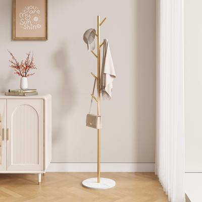 Elegante perchero de pie de metal con estante de almacenamiento para dormitorio y sala de estar.