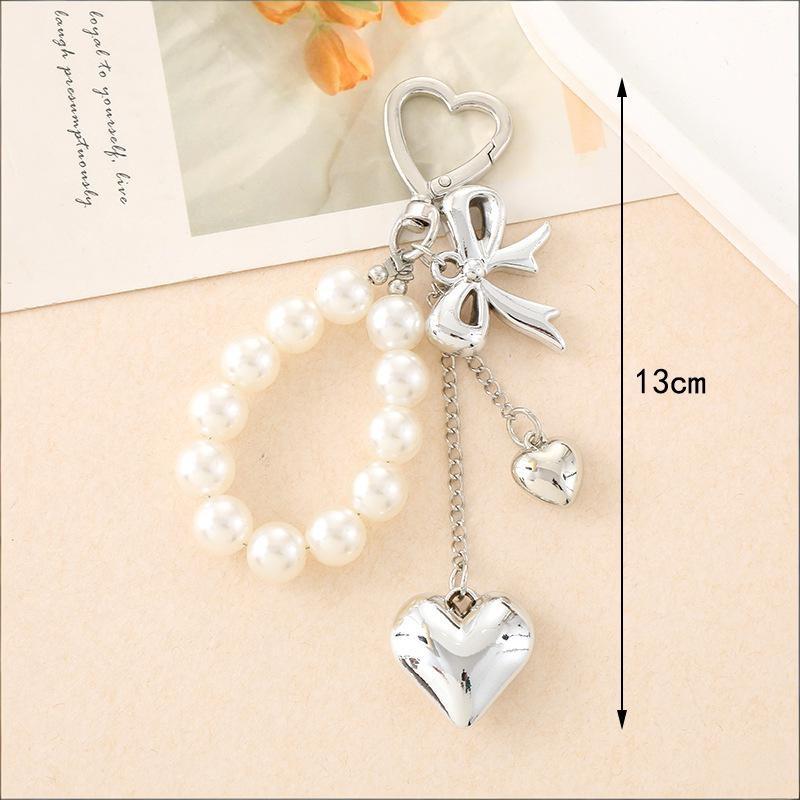 Fashionable Bow Key Pendant with Durable Design for Versatile Use As Keychain or Bag Accessory