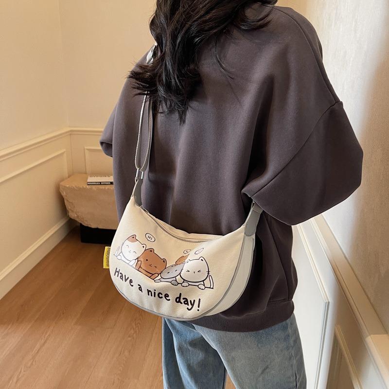 Niche Design Canvas Dumpling Bag Women's New Cartoon Printed Shoulder Bag Versatile Messenger Bag