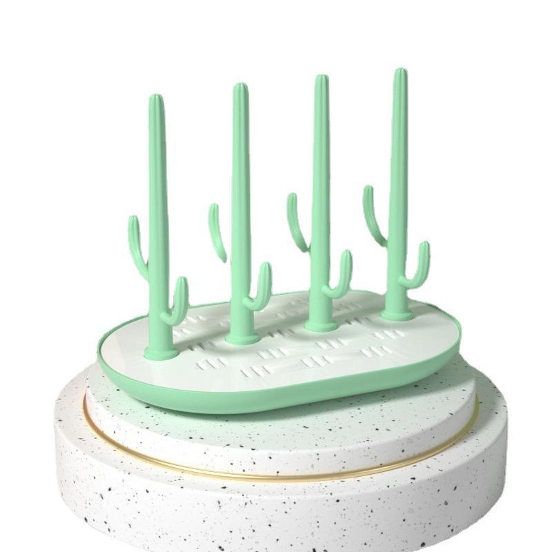 Versatile Baby Bottle Holder & Detachable Drying Rack with Pacifier Slot.