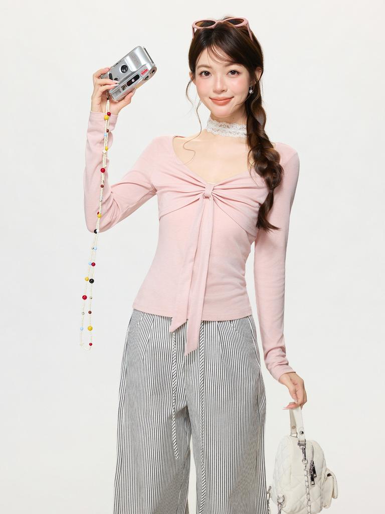 Pure Desire Pink Bow Design Sense V-neck Long-sleeved Knitted Sweater Women's Spring New Waist and Thin Temperament Top