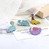 Creative Dinosaur Music Brooch: Cartoon Heart-Shaped Sleeping Design for Student Backpacks & Pendants