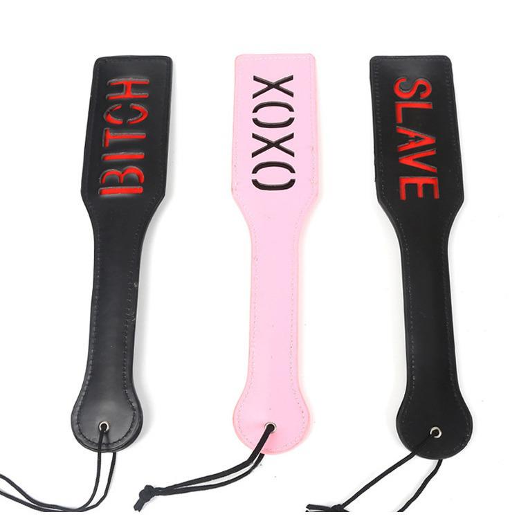 XOXO BDSM Hand Paddle: Erotic Training Tool for Couples' Foreplay and Punishment.