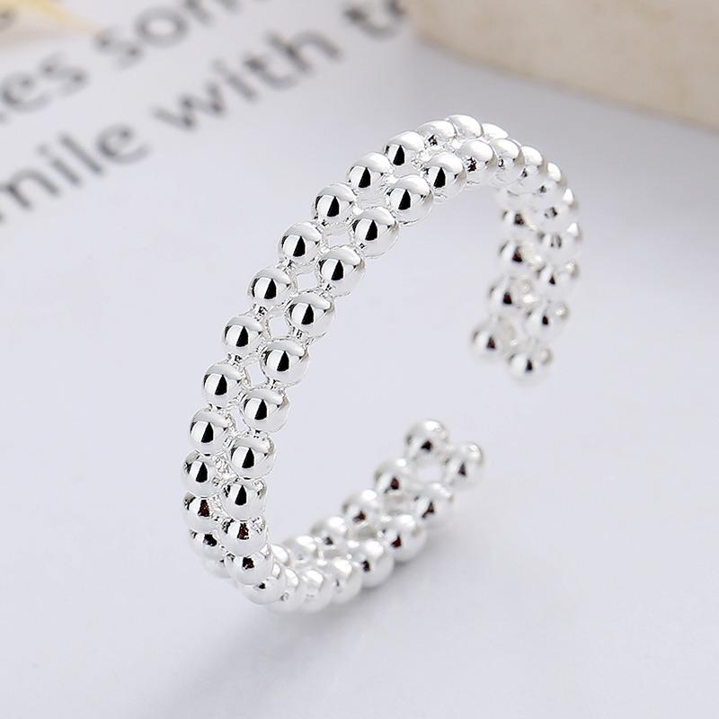 

Простое двухслойное кольцо из стерлингового серебра с шариком в горошек