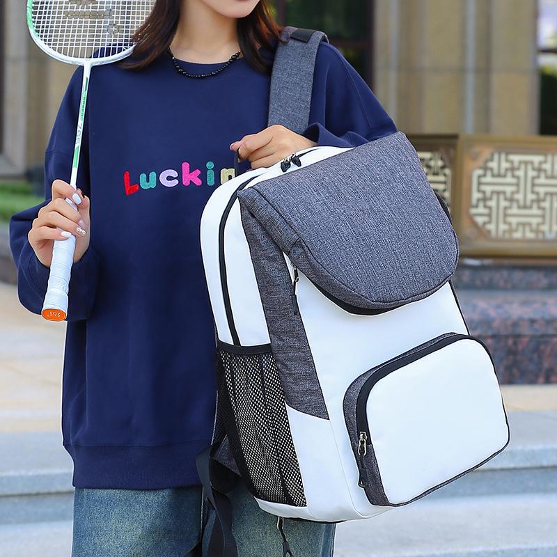 Wielofunkcyjny plecak sportowy i fitnessowy z przegrodą na buty, spersonalizowanym logo i oddzieleniem rzeczy suchych od mokrych. Idealny do gry w tenisa i badmintona.