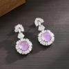 Elegant Ice Purple Egg-Shaped Earrings with Stepped Diamond Inlays