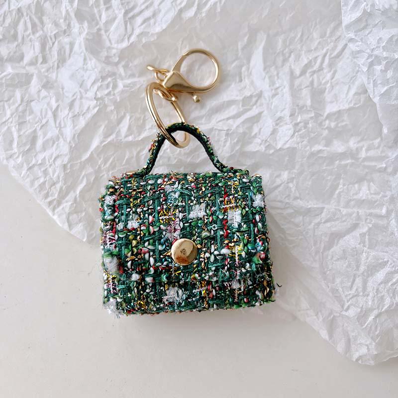 Fashion Mini Bag Keychain: Charm Pendant, Backpack, Handbag, Coin Purse, and Earphone Storage.