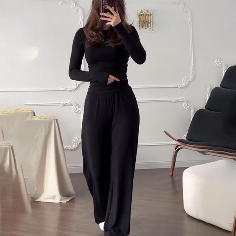 

Женский летний модный комплект 2025 года: облегающий топ с круглым вырезом и эластичные брюки широкого кроя Large