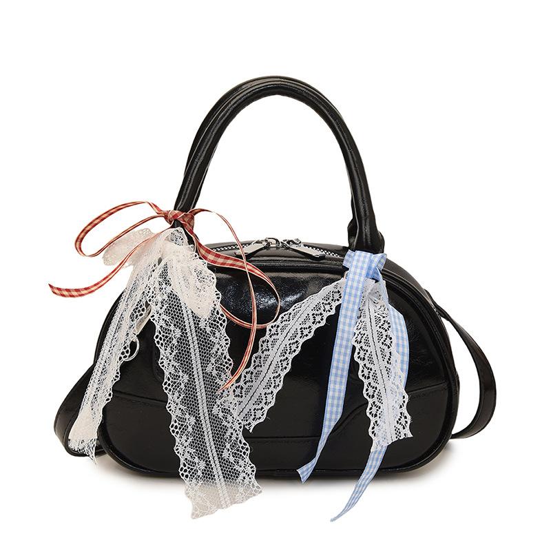 Frühling 2025 neu Ou Ruofeng Koreanische Version von einfacher tragbarer Boston-Tasche Nische lässig vielseitige Umhängetasche Tasche Damen