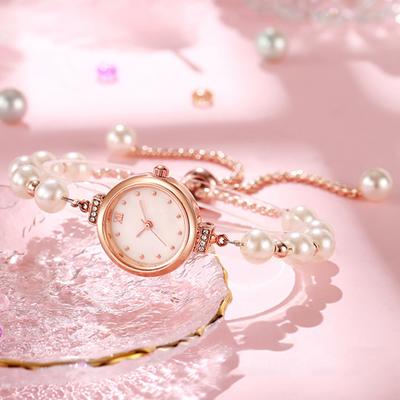 Dámské náramkové hodinky s nastavitelným řemínkem z umělých perel, kulatým ciferníkem s kamínky, dámské ležérní formální quartzové náramkové hodinky s módními šperky