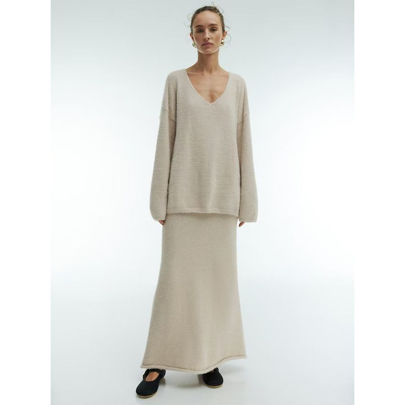 

Модный ветер Простой вязаный свитер с V-образным вырезом Юбочный костюм Вязаный свитер и юбка Apricot color M