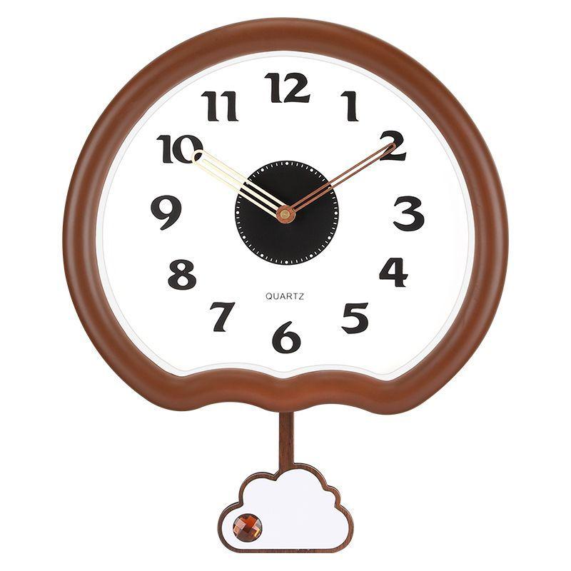 This wall clock is a modern, creative and personalized quartz clock for home use in the living room with a simple cream style
