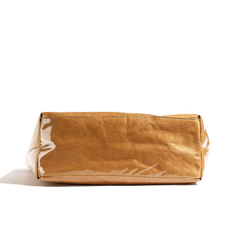 Glänzende DuPont-Papier- und PVC-Tragetasche mit kräftiger Beschriftung und wasserabweisendem Design