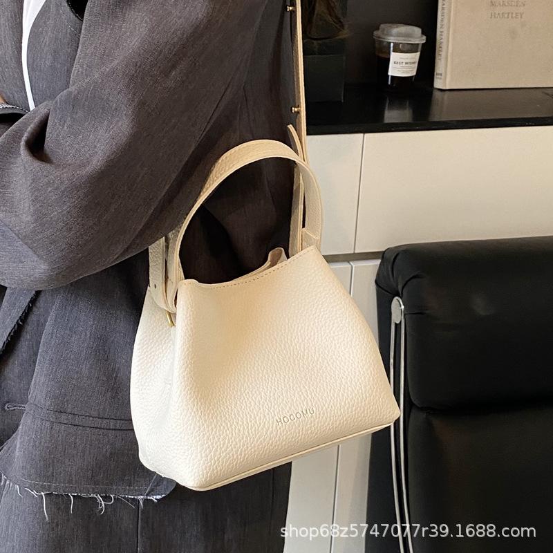 Fashion design hand-held small bag bag women's 2025 new retro versatile bucket bag women's commuter shoulder crossbody bag