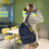 Schoolbag Korean version ins Large capacity solid color campus simple and lightweight versatile letter schoolbag 3rd to 6th grade students shoulder