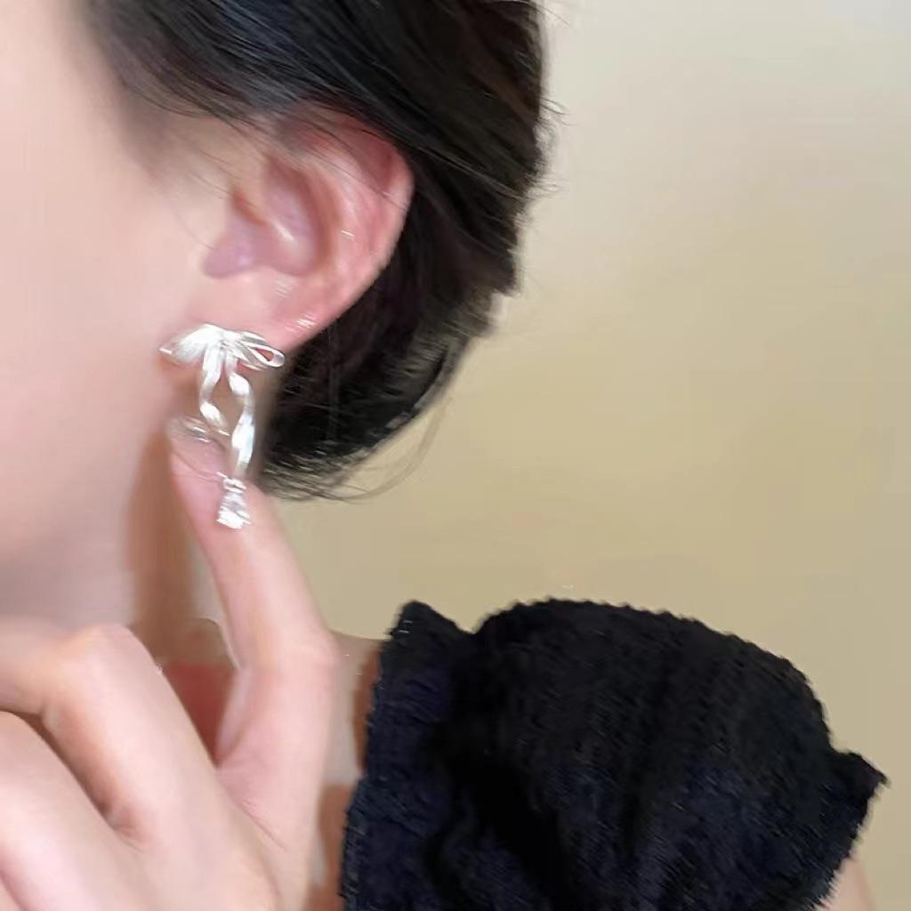 Elegant Bow Ribbon Zirconia Stud Earrings for Women with S925 Silver Needles - Sweet, High-End Celebrity Style.