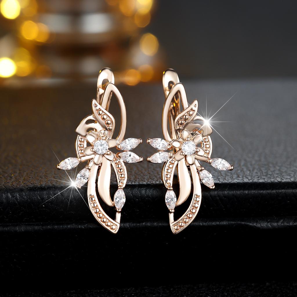 Popular wind hollow flower-shaped ear buckle female bling zircon + tendrils atmosphere niche flower cluster earrings