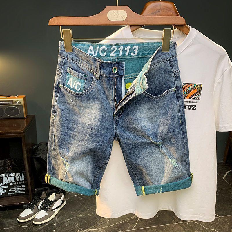 Pantaloncini di jeans da uomo, estivi sottili larghi dritti casual alla moda marca strappati cinque o sei divisione del lavoro pantaloni da uomo
