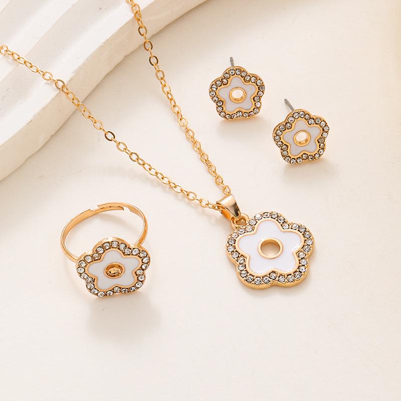 Women's Cold Style Jewelry Set: Diamond-Studded, Oil-Dripped Five-Leaf Clover & Hollow Star Necklace, Ring, Earrings