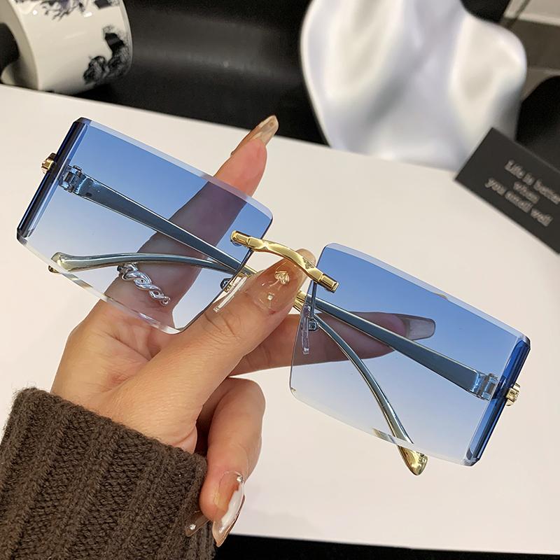 New Curved Lens Leopard Head Metal Frameless Edge Cutting High-Quality Sunglasses 90300