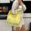 Korean Version of Fashion Underarm Bag Women's 2025 New Letter Print Canvas Bag Large Capacity Shoulder Tote Bag