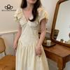 Francouzské retro Hepburn elegantní plisovaný výstřih bez rukávů Středně dlouhé šaty úzkého střihu Dámská móda Elegantní společenské dlouhé šaty