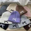 Hat women's autumn and winter wool hat new cute bow versatile cold hat ear protection warm knitted hat tide