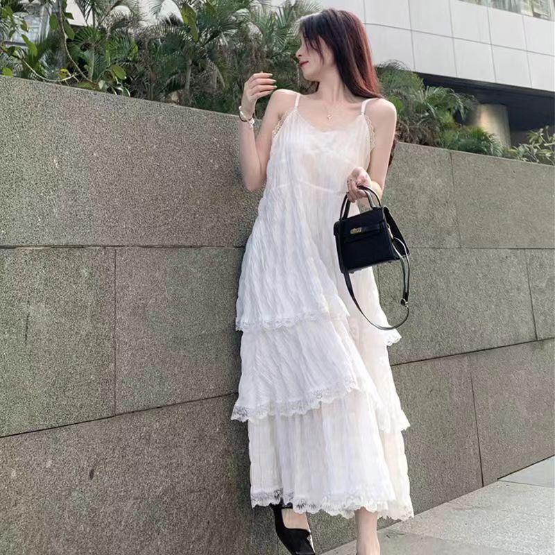French super fairy V-neck mid-length slip cake dress women's new Korean version of the seaside resort beach dress