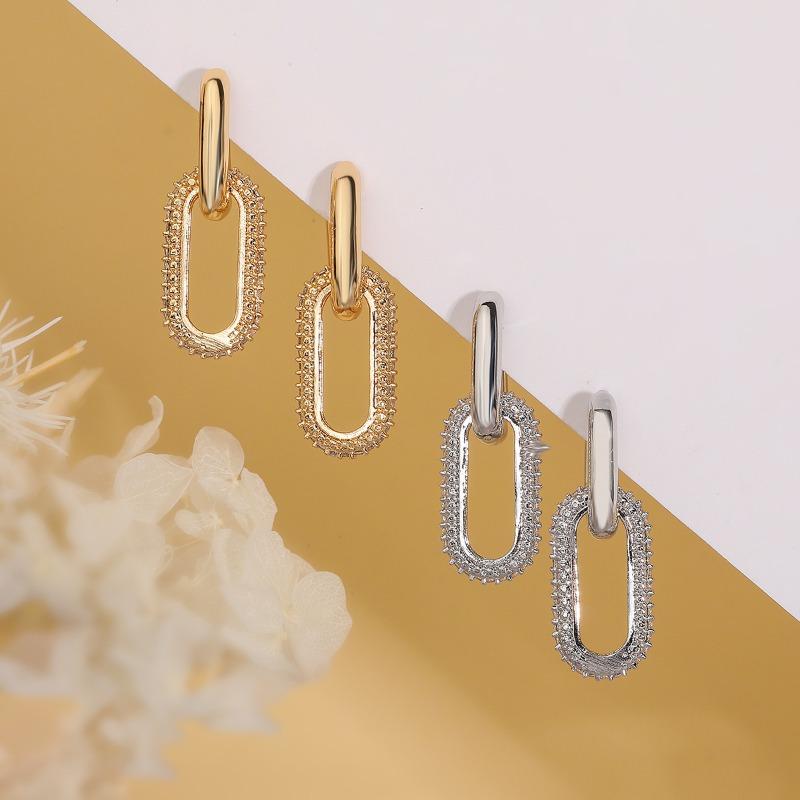 Goldfarbene Hängeohrringe mit glänzendem Zirkon-Dekor Elegantes minimalistisches Doppelschleifen-Design Creolen Schmuck Geschenk für Frauen
