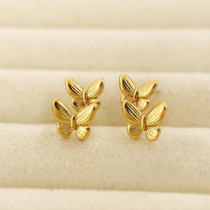 Minimalistische Doppel-Schmetterling-Ohrringe: Elegante High-End Damen-Stecker mit modischem Design