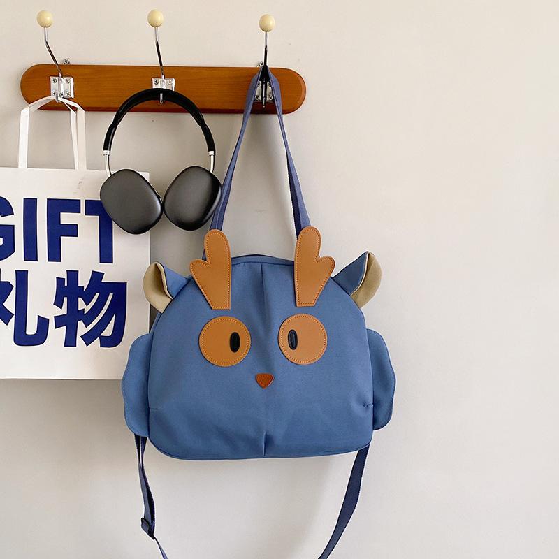 

сумка на плечо сумка через плечо мультфильм сумка для учеников средней школы повседневная парусиновая большая вместительная школьная сумка симпатичная ветровая сумка для поездок на работу синий