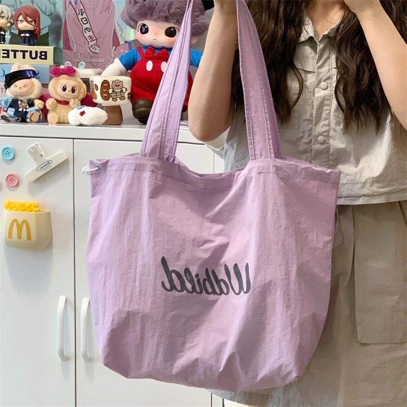 

Loose Tote Bag Women 2025 New Drawstring Canvas Bag Commuter Lightweight Handbag Large Capacity Shoulder Bag Purple Letter Drawstring