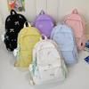Japanese bow schoolbag for female junior high school students, cute versatile large-capacity backpack, high-value student backpack tide