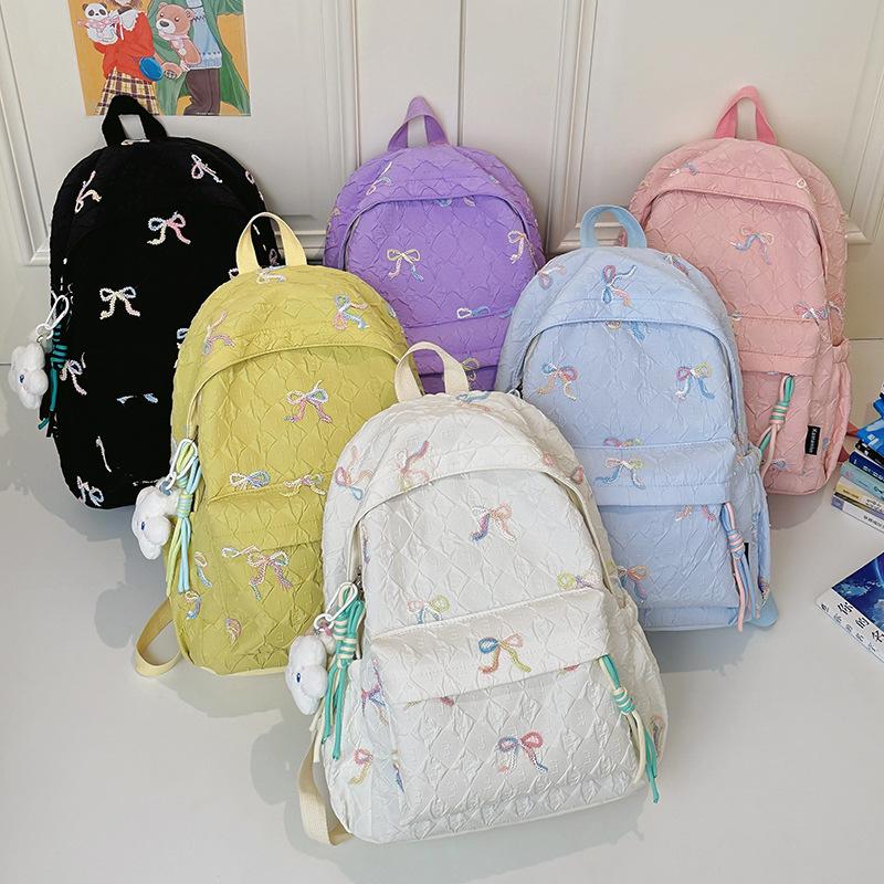 Japanese bow schoolbag for female junior high school students, cute versatile large-capacity backpack, high-value student backpack tide