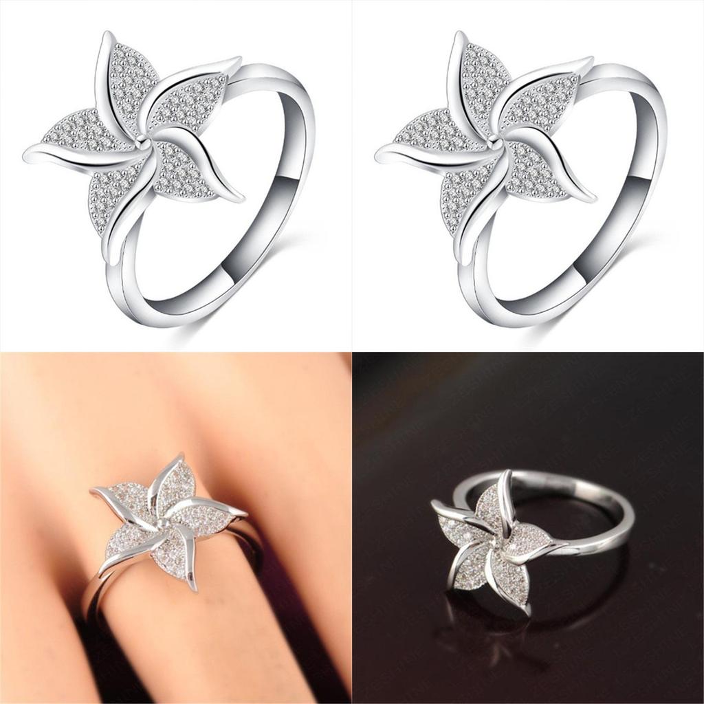 Stunning Fashion Windmill Shape Ring With Silver Plated Flower Design For Women