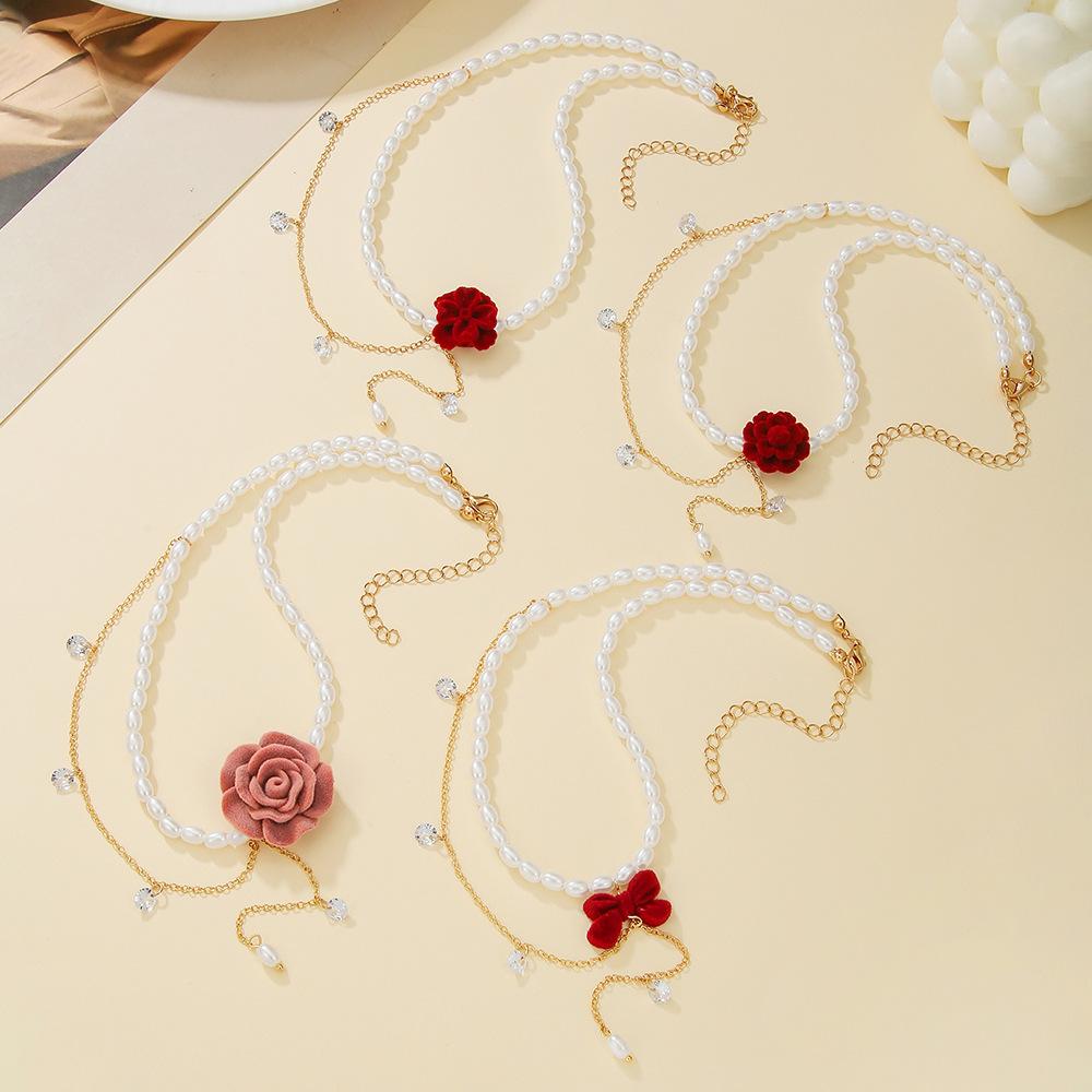 Japan and Korea fashion flower imitation pearl necklace, retro rhinestone bow temperament collarbone chain women's jewelry