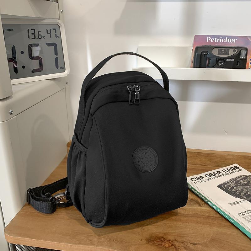 

School bag Japanese original solid color letter school bag simple and lightweight backpack class commute large capacity school bag leisure breast bag
