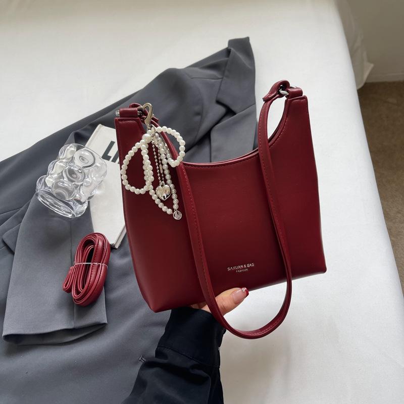 

Женская сумка новая, нишевый багет высокого чувства. красный